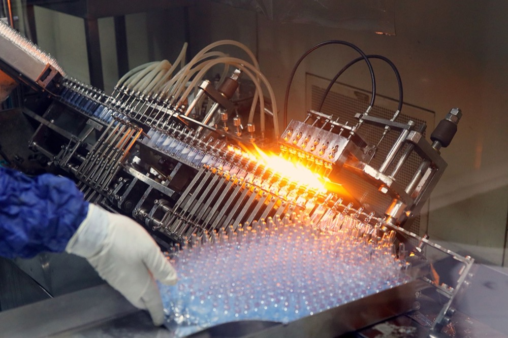 An ampoule filling and sealing line in a pharmaceutical plant.